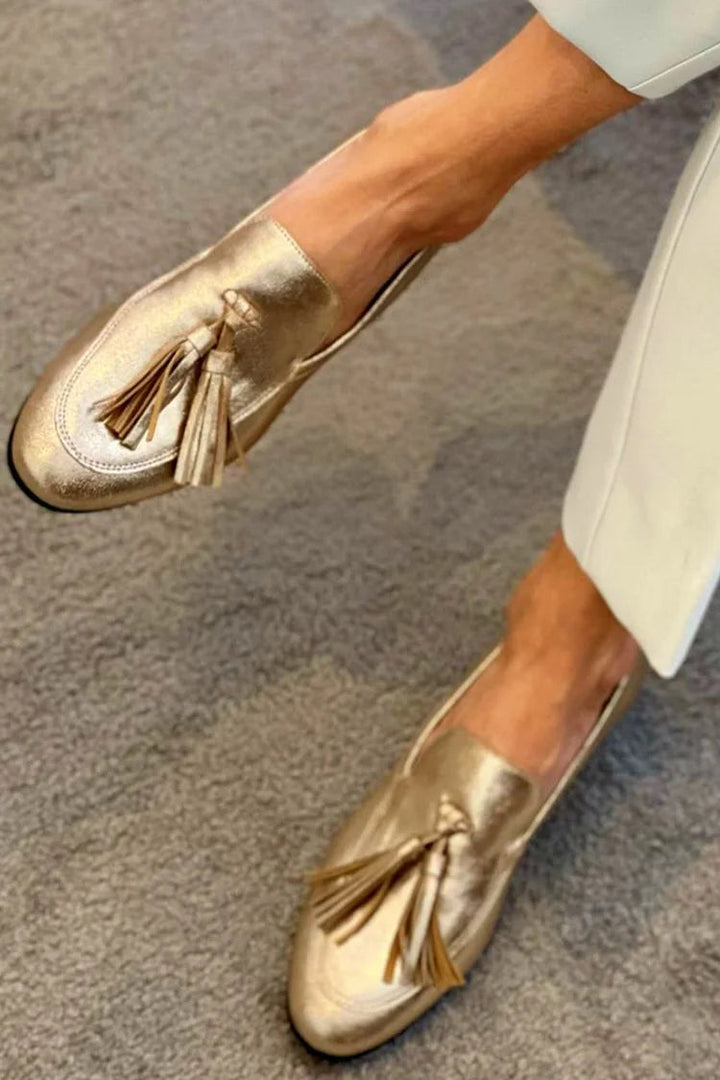 GOLDENE MOKASSINS MIT QUASTEN