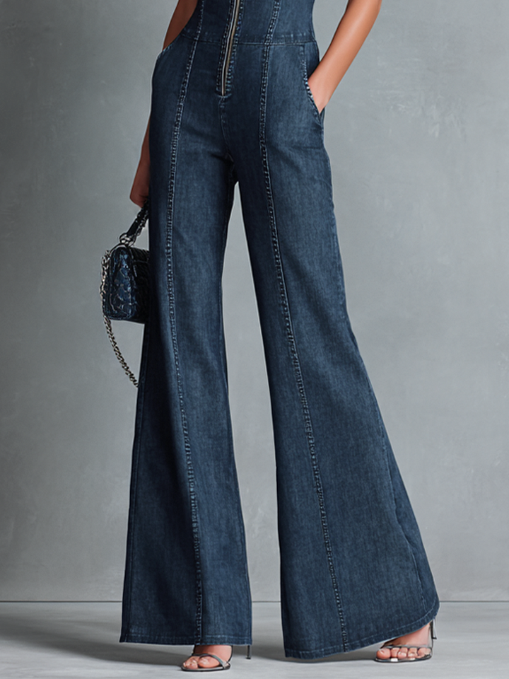Dunkelblauer, ärmelloser Jumpsuit im Retro-Stil für Damen mit Stehkragen, ausgestelltem Schnitt und Reißverschluss vorne.