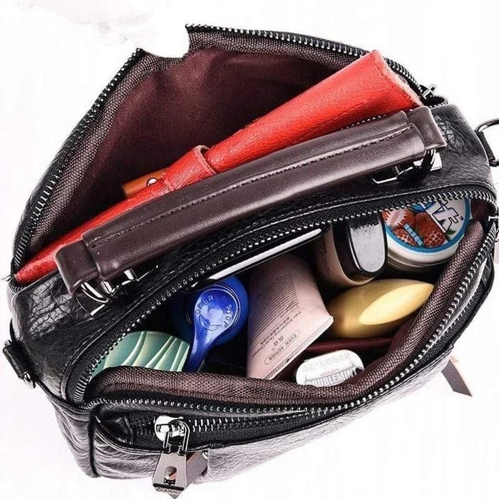 Finbjørg | Kleine und vielseitige Tasche in goldenem Cognac-Ton