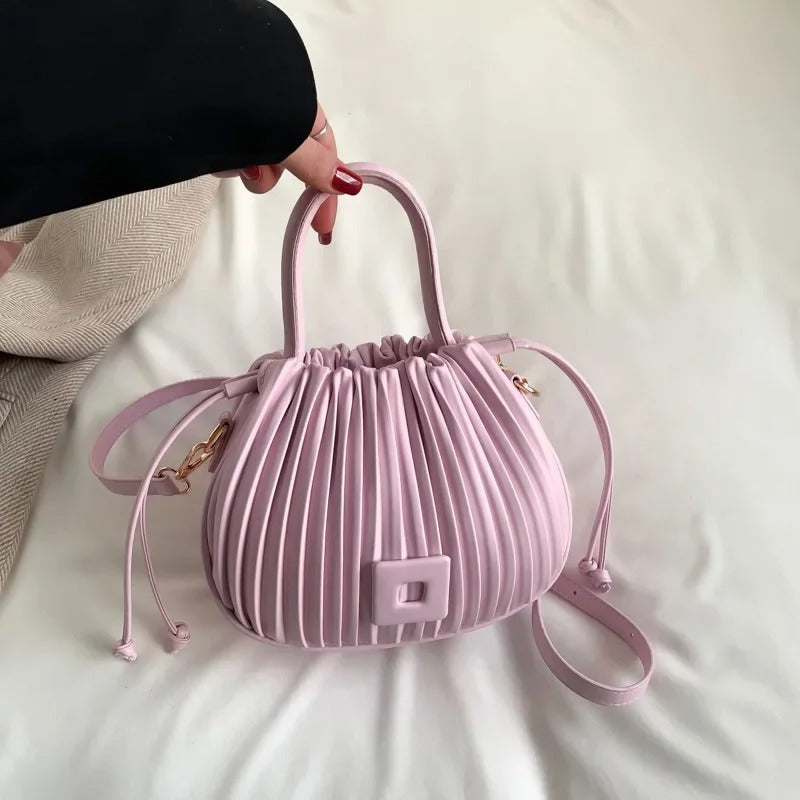 Kåra | Elegante Faltenhandtasche in Puderrosa
