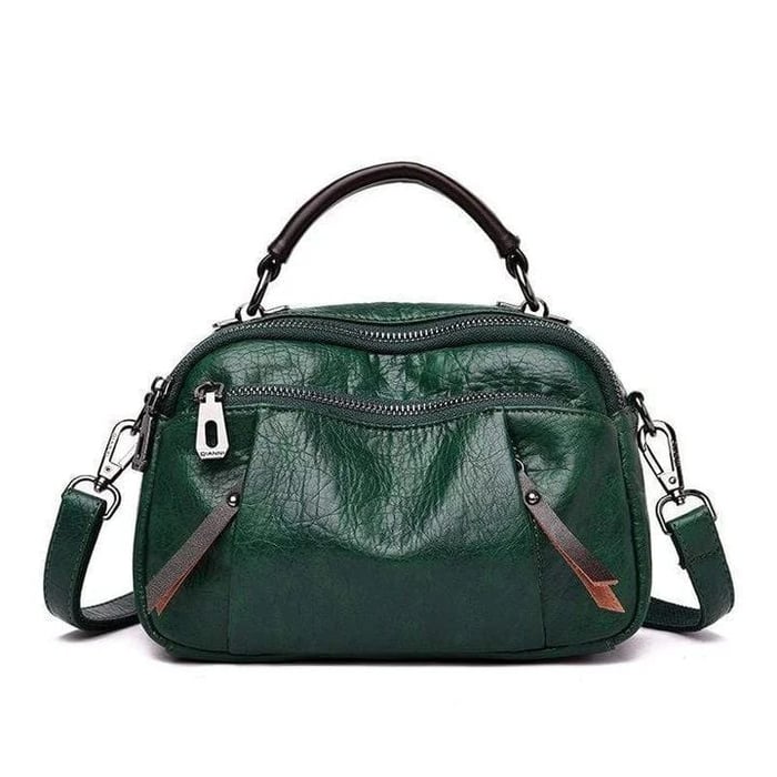 Finbjørg | Kleine und vielseitige Tasche in goldenem Cognac-Ton