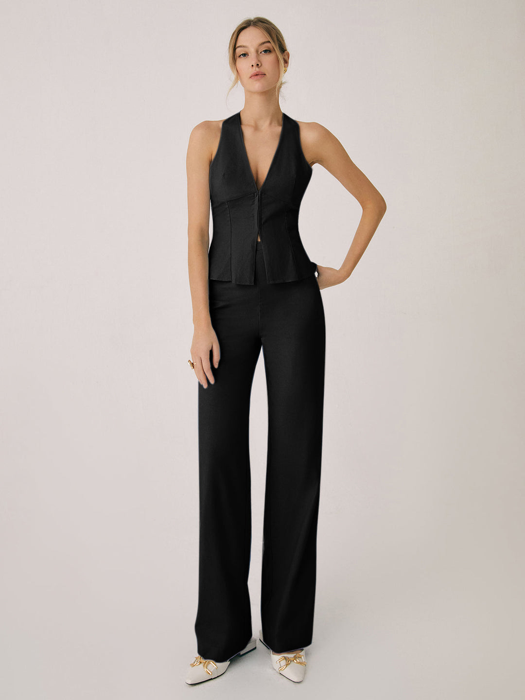Set da donna con top all’americana con scollo a V e pantaloni a gamba larga