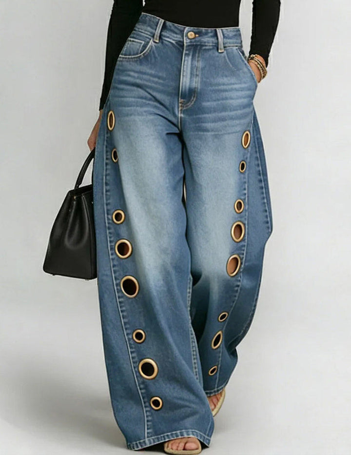 Weite Denim-Hosen mit goldenen Ösen-Seitenausschnitten