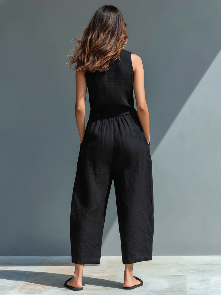 Minimalistischer Damen-Jumpsuit mit Stehkragen, Knopfleiste und lässiger, lockerer Passform