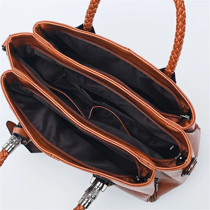 Jarnfrid | Elegante Handtasche mit geflochtenem Griff