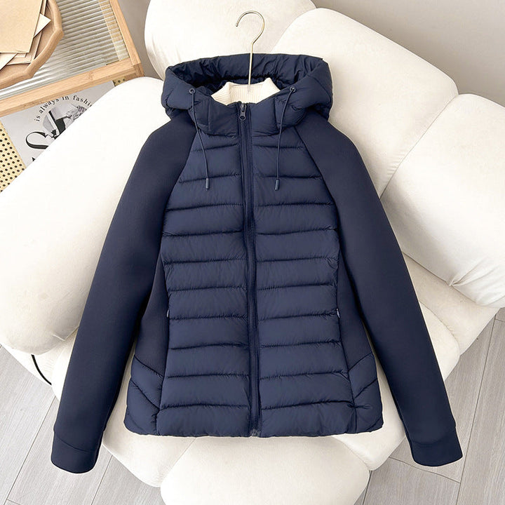 Damen leichte Hybrid-Steppjacke mit Kapuze und elastischen Ärmelpaneelen