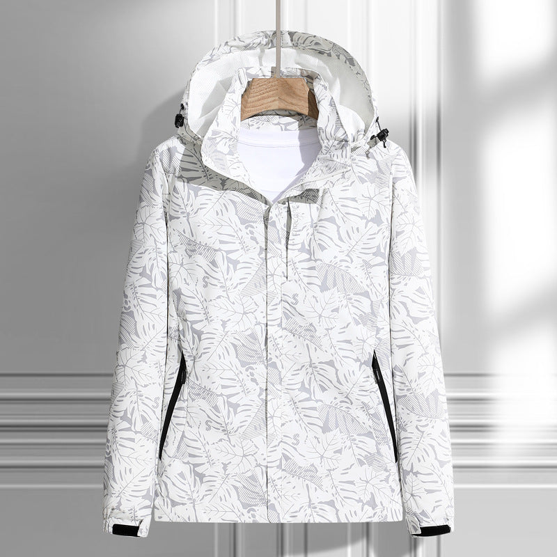 Damen leichte packbare Regen- und Windjacke mit Kapuze, Blattmuster