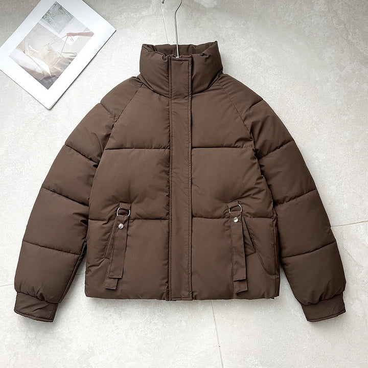 Damen kurze gesteppte Pufferjacke mit hohem Stehkragen und D-Ring-Tasche