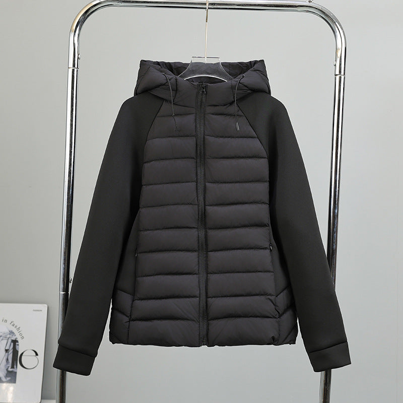 Damen leichte Hybrid-Steppjacke mit Kapuze und elastischen Ärmelpaneelen