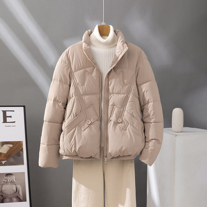 Women's short quilted blouson jacket with a high collar and flap pockets