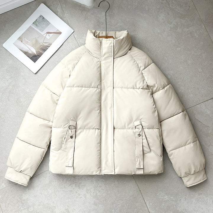 Damen kurze gesteppte Pufferjacke mit hohem Stehkragen und D-Ring-Tasche