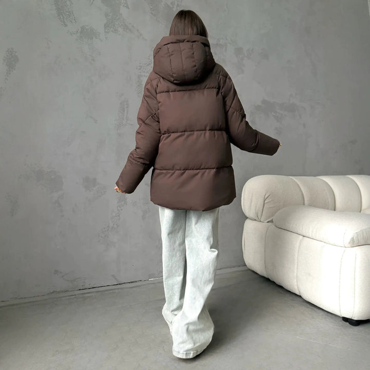 Damen Oversized Steppjacke mit Kapuze und integrierten Taschen