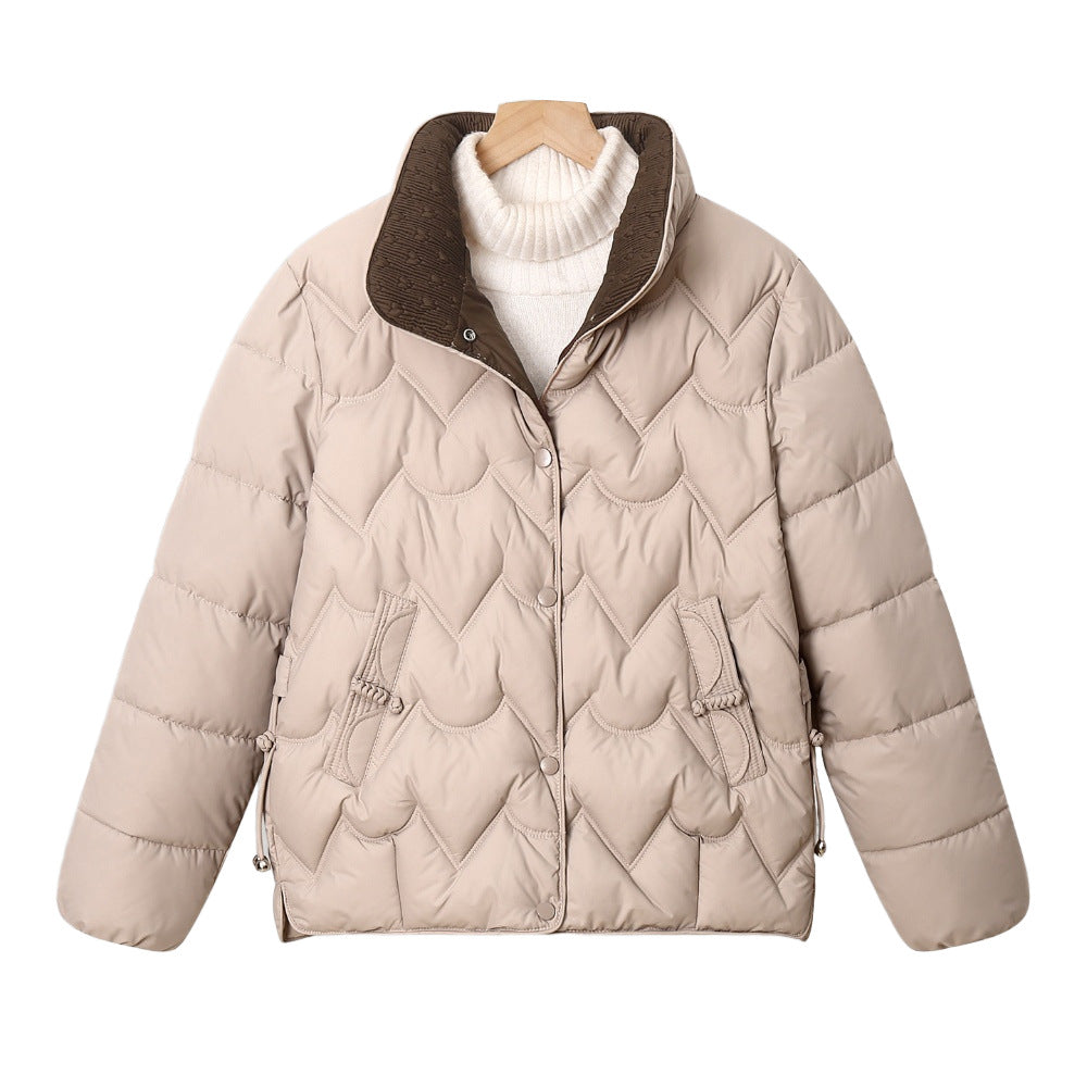 Women’s short quilted puffer jacket with arched quilting and snap-button placket