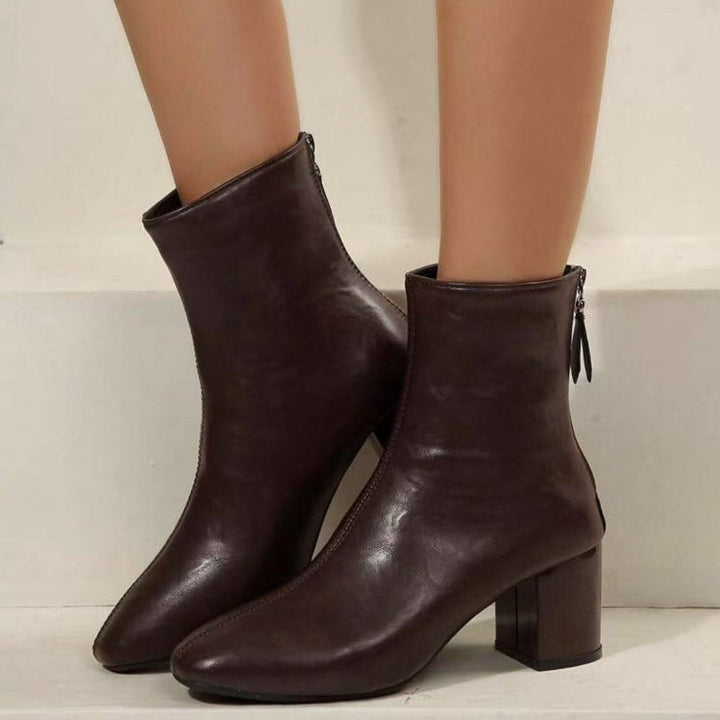 Botins de senhora com fecho e salto bloco moderado