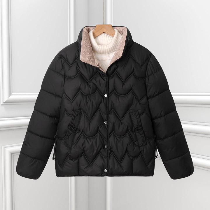 Women’s short quilted puffer jacket with arched quilting and snap-button placket
