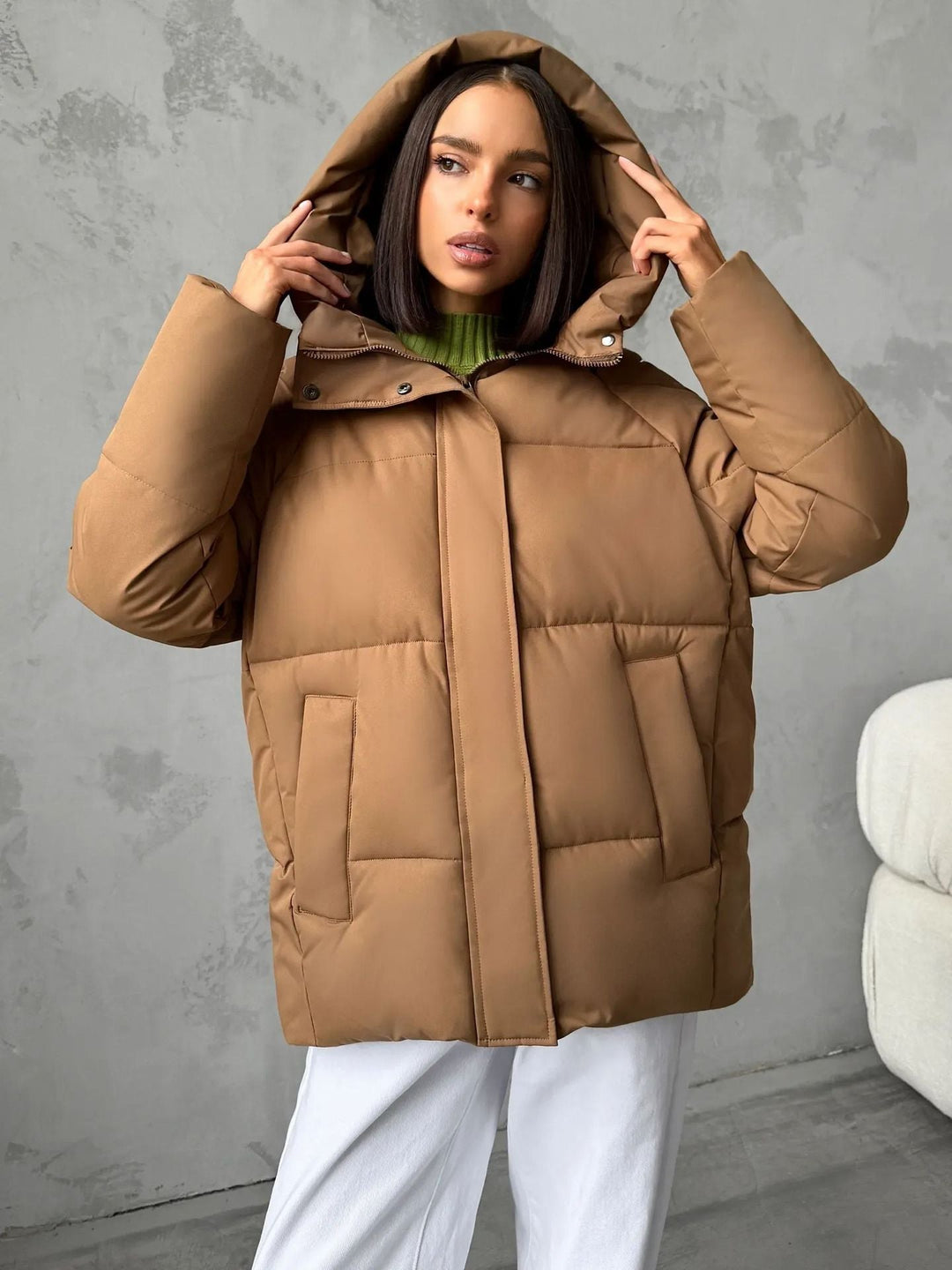 Damen Oversized Steppjacke mit Kapuze und integrierten Taschen