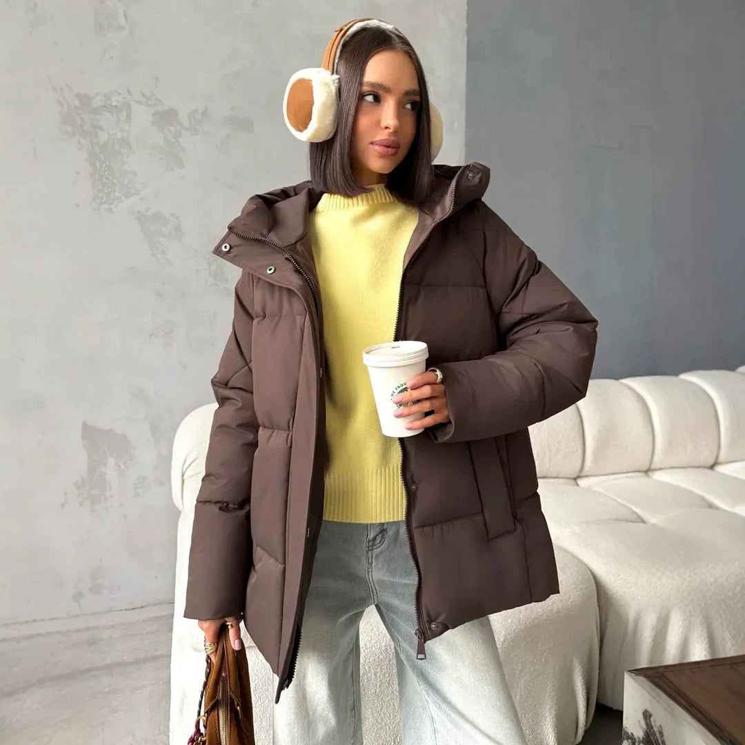 Damen Oversized Steppjacke mit Kapuze und integrierten Taschen