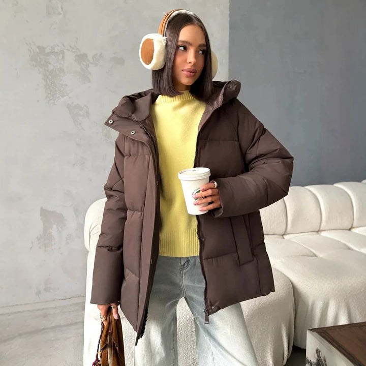 Damen Oversized Steppjacke mit Kapuze und integrierten Taschen