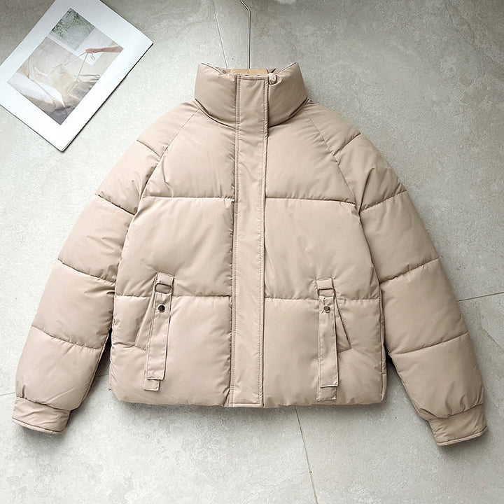 Damen kurze gesteppte Pufferjacke mit hohem Stehkragen und D-Ring-Tasche