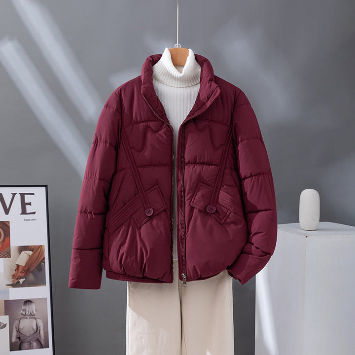 Women's short quilted blouson jacket with a high collar and flap pockets