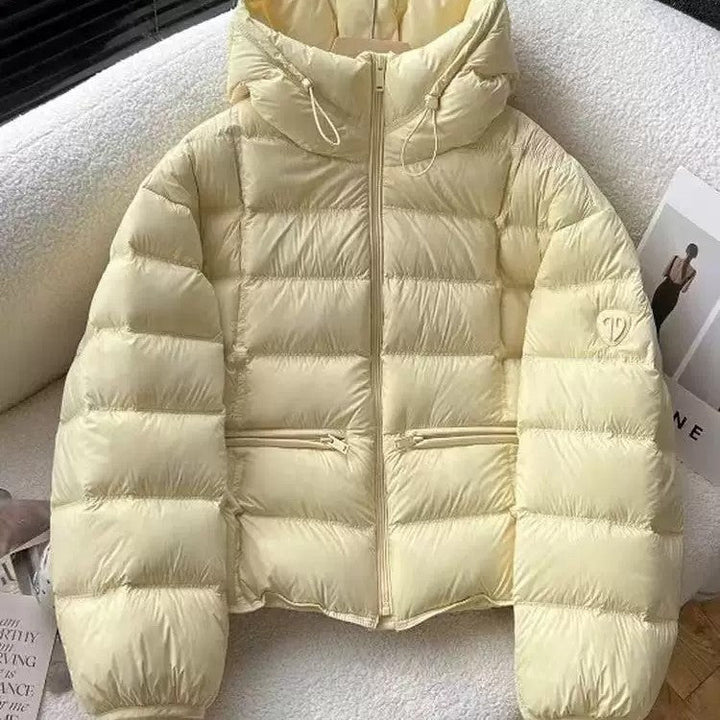 Damen kurz geschnittene Thermo-Steppjacke mit Kapuze und Reißverschlusstaschen