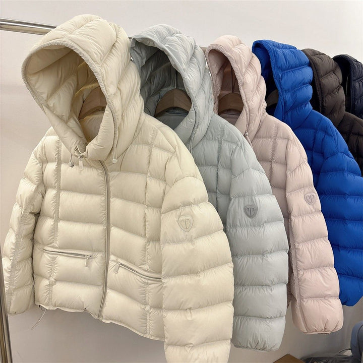 Damen kurz geschnittene Thermo-Steppjacke mit Kapuze und Reißverschlusstaschen