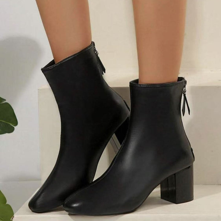Botins de senhora com fecho e salto bloco moderado