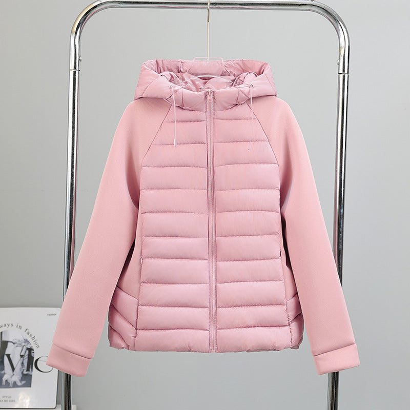 Damen leichte Hybrid-Steppjacke mit Kapuze und elastischen Ärmelpaneelen