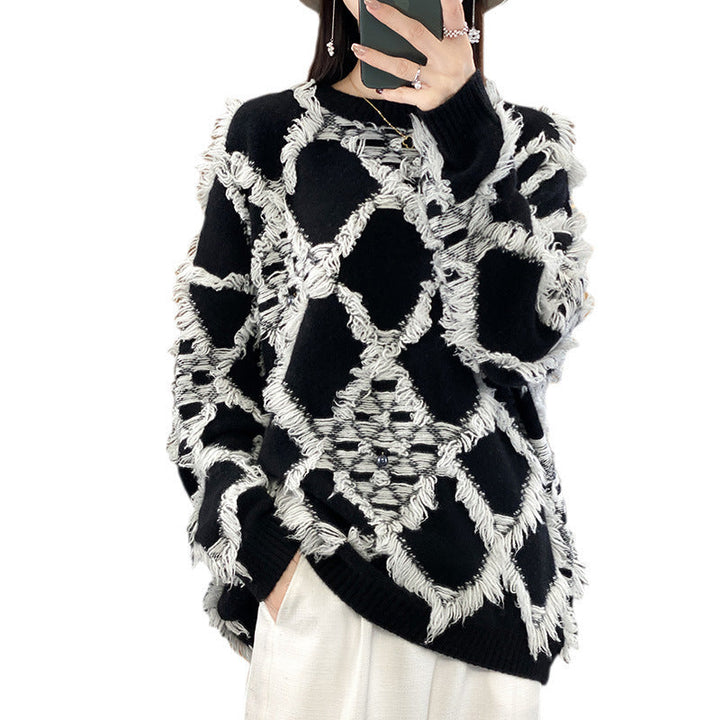 Γυναικείο oversized πουλόβερ με στρογγυλή λαιμόκοψη και κρόσσια