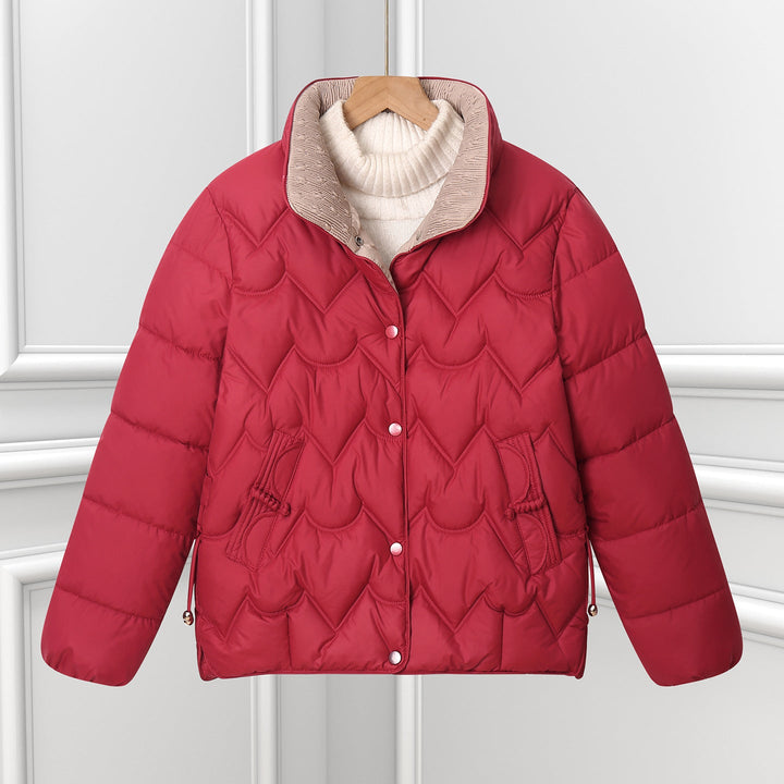 Women’s short quilted puffer jacket with arched quilting and snap-button placket