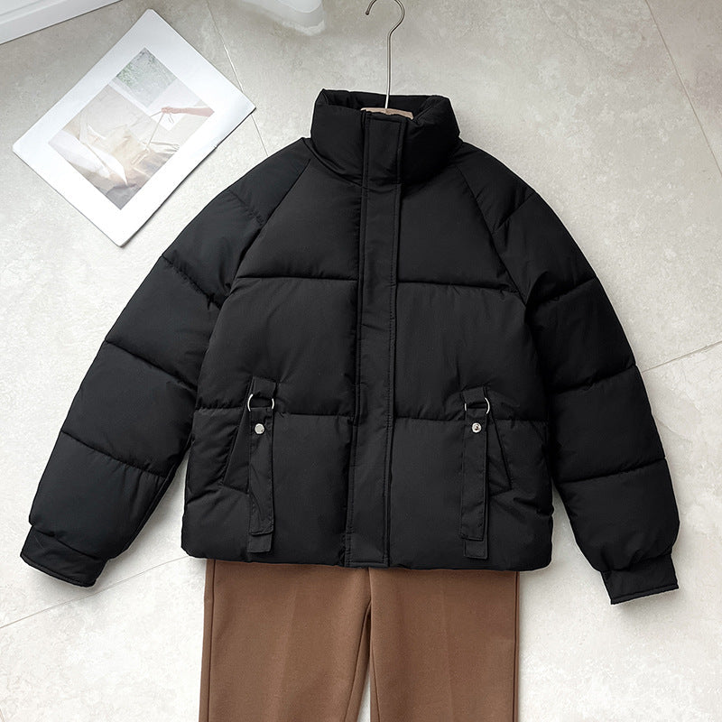 Damen kurze gesteppte Pufferjacke mit hohem Stehkragen und D-Ring-Tasche