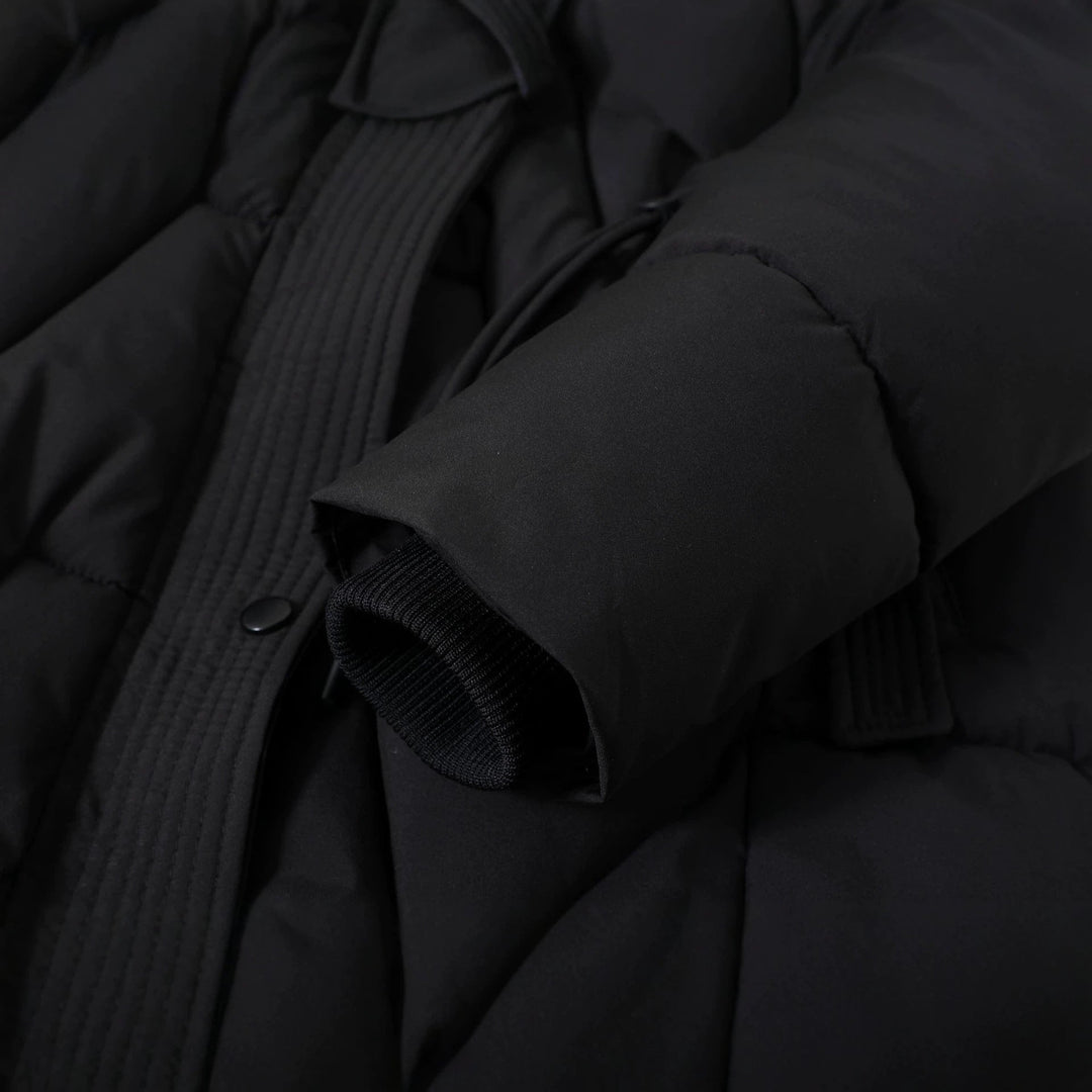 Damen langer gesteppter Parka mit Kunstfellkapuze und Kordelzug