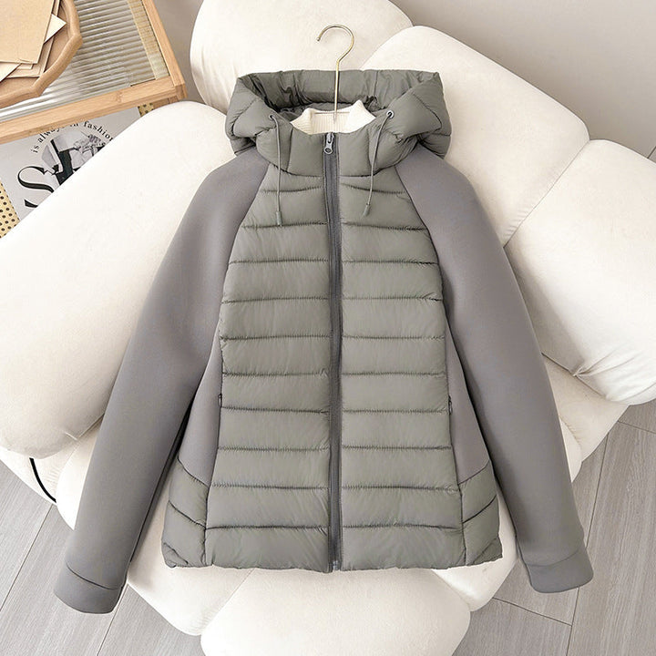 Damen leichte Hybrid-Steppjacke mit Kapuze und elastischen Ärmelpaneelen