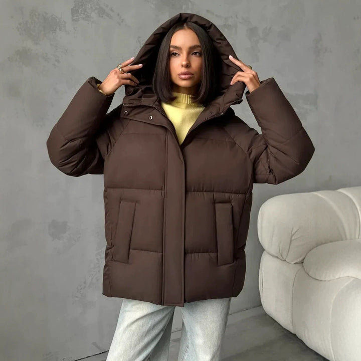 Damen Oversized Steppjacke mit Kapuze und integrierten Taschen