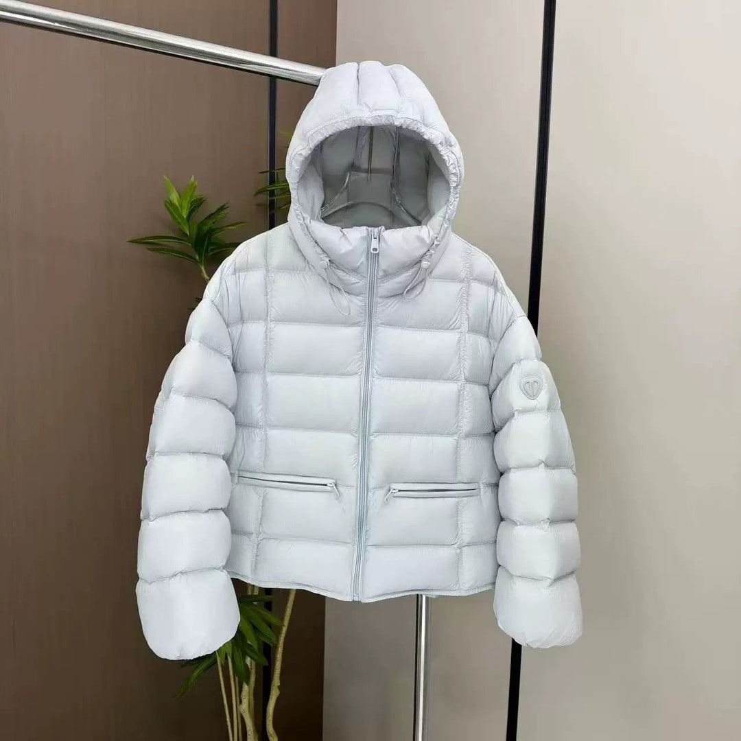 Damen kurz geschnittene Thermo-Steppjacke mit Kapuze und Reißverschlusstaschen