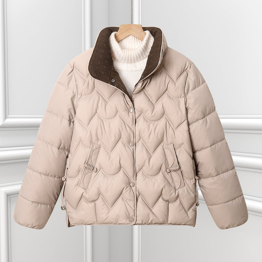 Women’s short quilted puffer jacket with arched quilting and snap-button placket