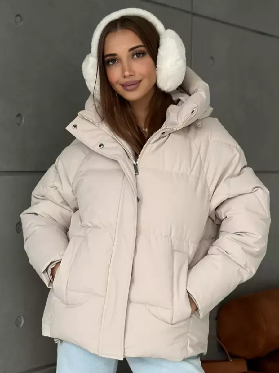 Damen Oversized Steppjacke mit Kapuze und integrierten Taschen