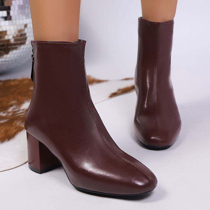 Botins de senhora com fecho e salto bloco moderado