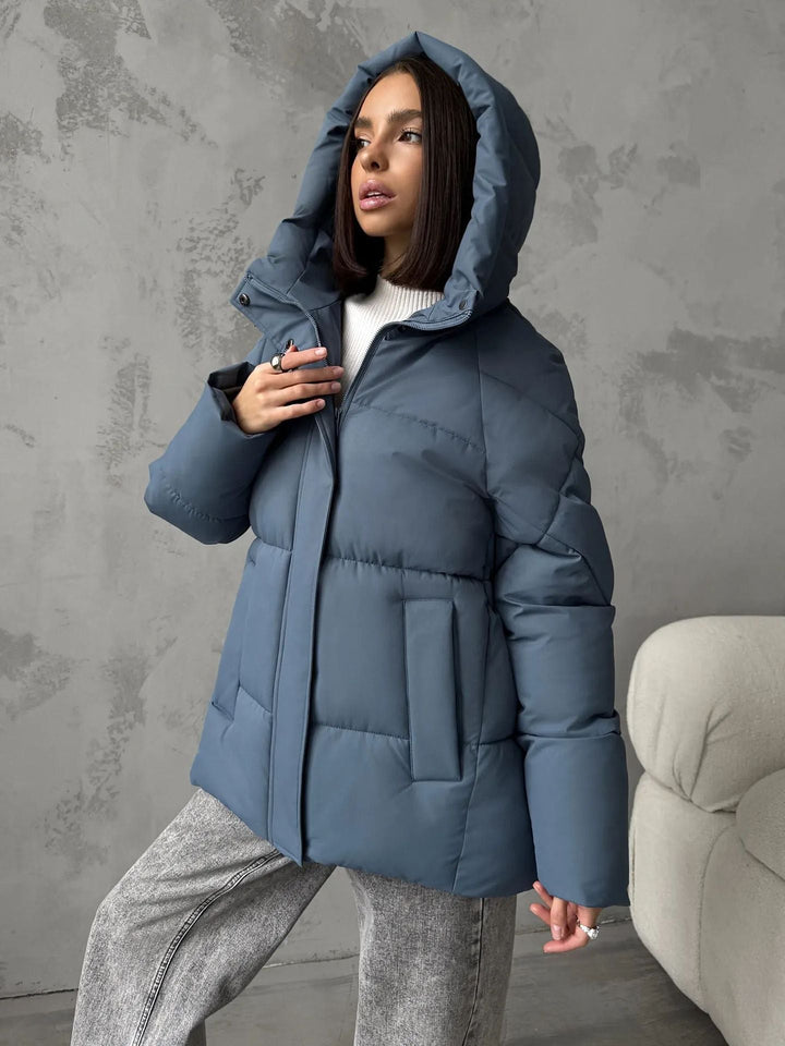 Damen Oversized Steppjacke mit Kapuze und integrierten Taschen