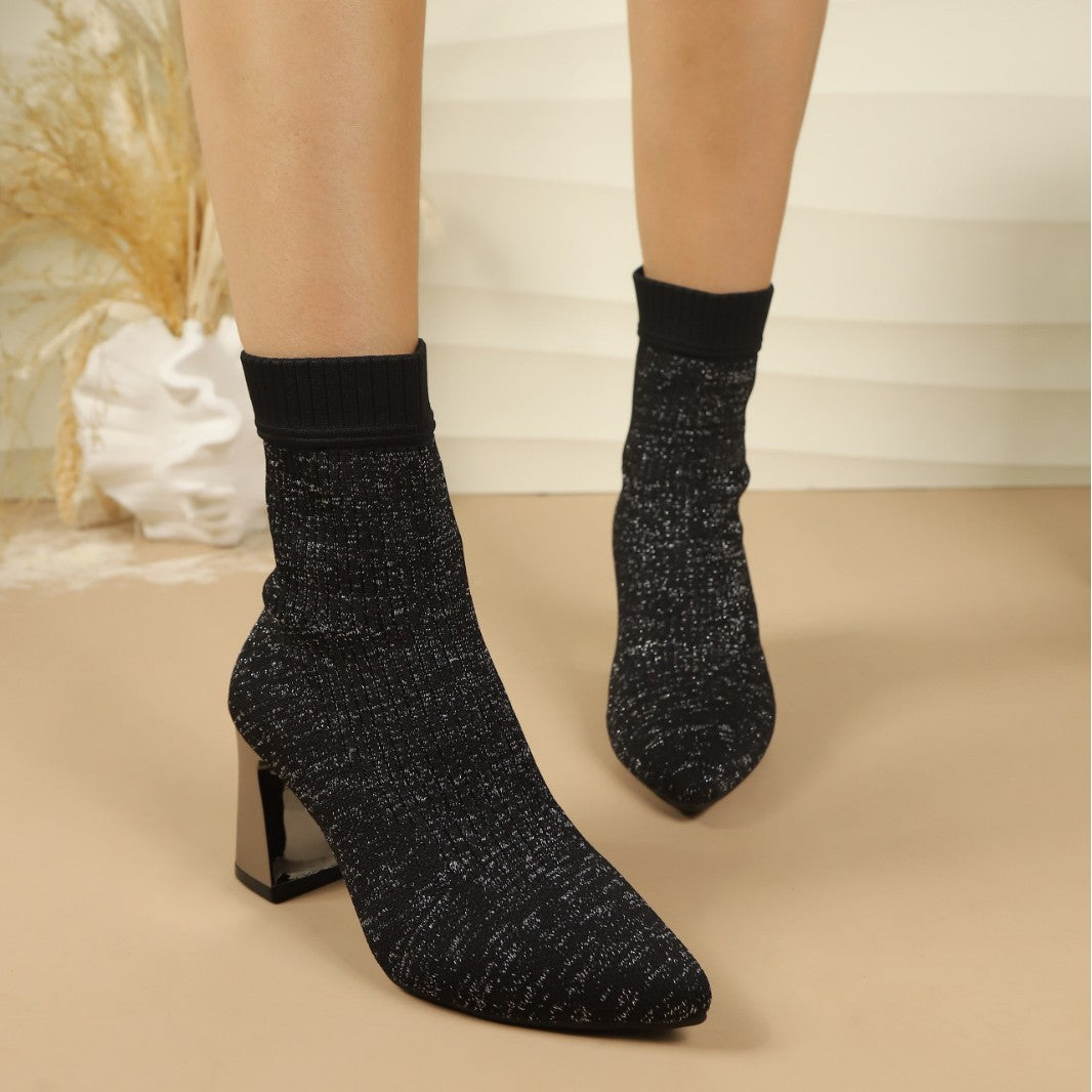Women’s sock ankle boots with block heels and a ribbed texture