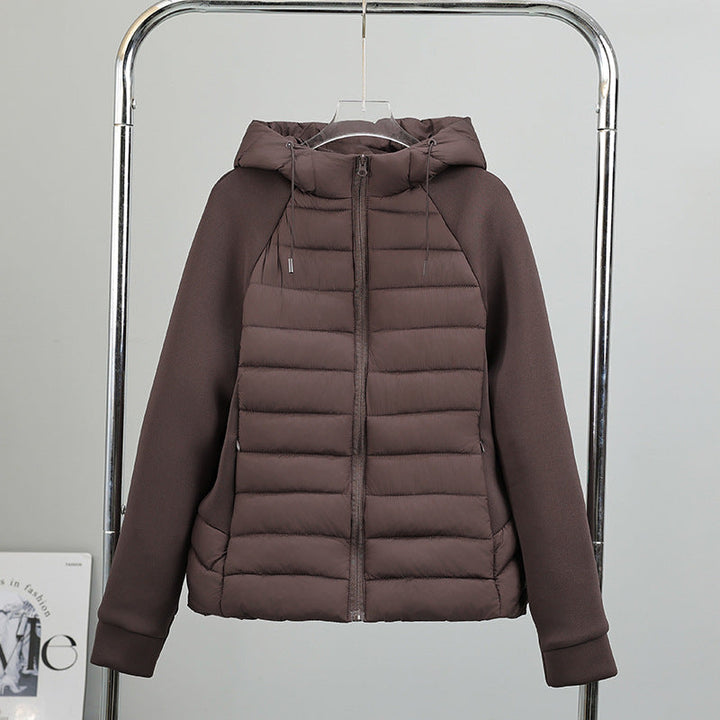Damen leichte Hybrid-Steppjacke mit Kapuze und elastischen Ärmelpaneelen