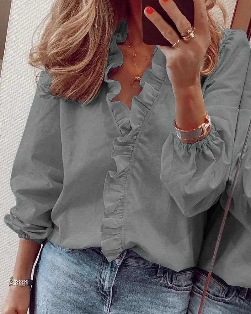 Enola™ | Feminine Bluse mit verspielten Rüschen
