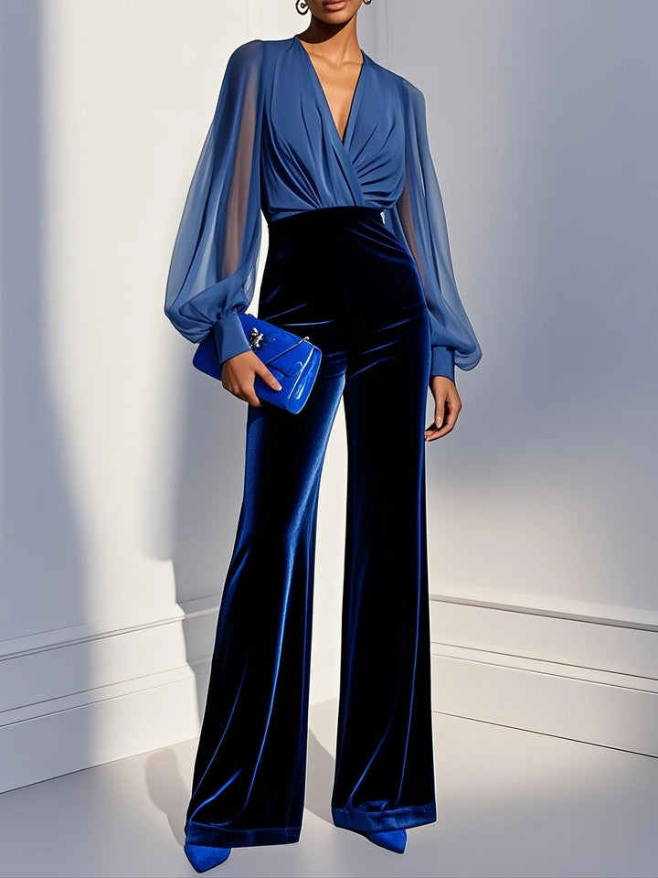 Samt-Jumpsuit mit langen Ärmeln und blauem Mesh-V-Ausschnitt