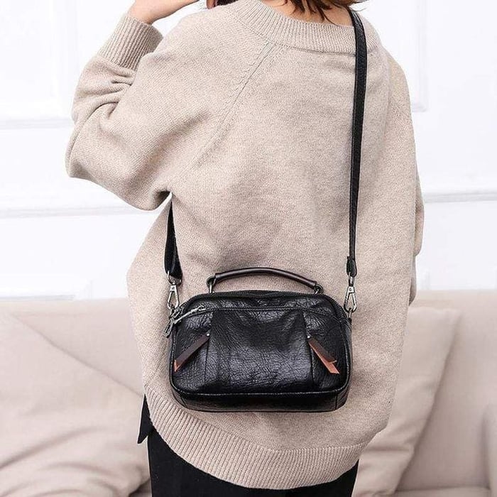 Finbjørg | Kleine und vielseitige Tasche in goldenem Cognac-Ton