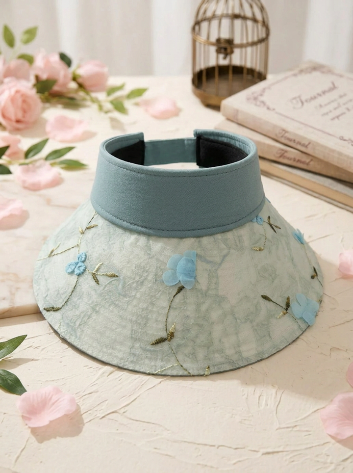 Faltbarer Strohhut mit Blumenakzent und UV-Schutz