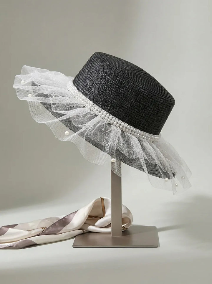 Women's sun hat with tulle trim and pearl embellishment