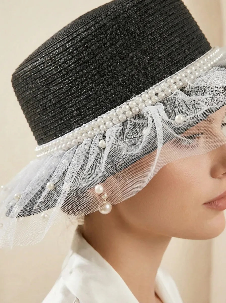 Women's sun hat with tulle trim and pearl embellishment