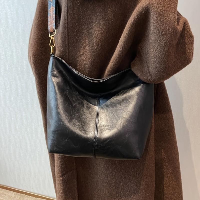 Embjørg | Klassische Schultertasche mit verstellbarem gemustertem Tragegurt