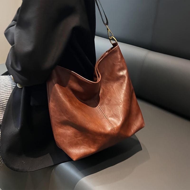 Embjørg | Klassische Schultertasche mit verstellbarem gemustertem Tragegurt