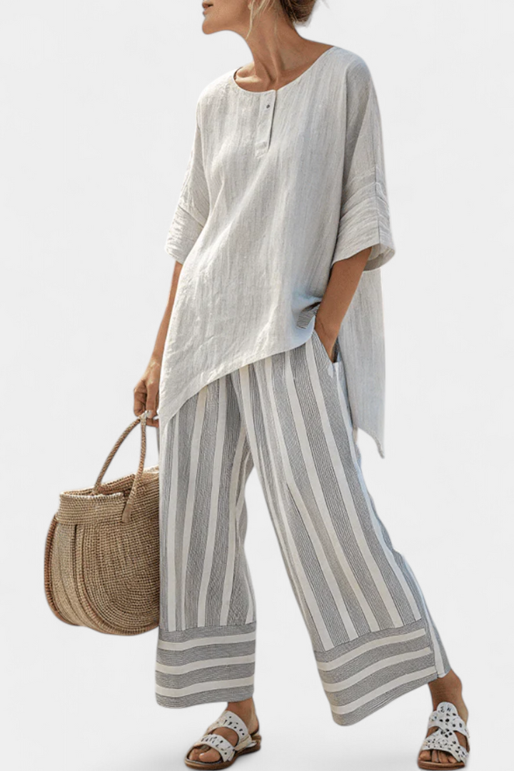 Fiorella – elegante asymmetrische Bluse und gestreifte Hose